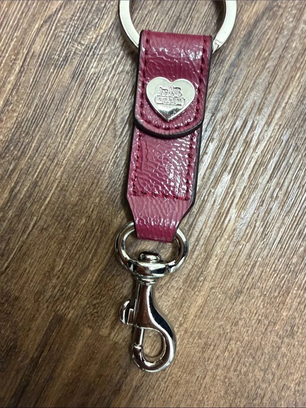 Coach Burgundy Leather Key Strap with Heart Medallion